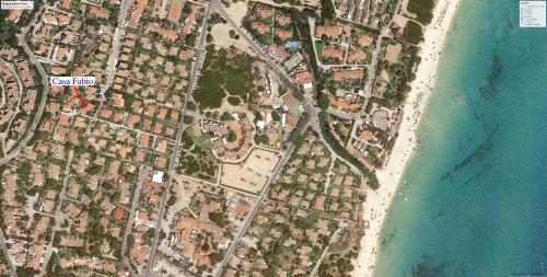 vista satellitare su una spiaggia e sull'oceano di Casa Gianfabio a Costa Rei