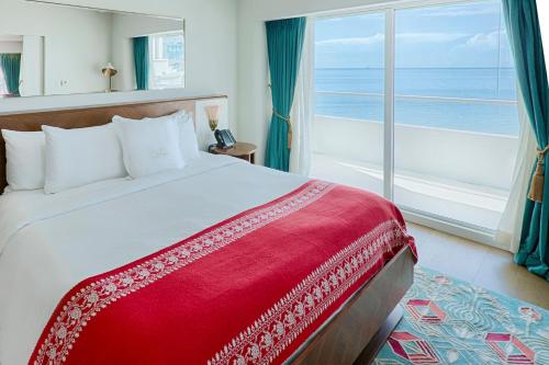 Ένα ή περισσότερα κρεβάτια σε δωμάτιο στο Faena Hotel Miami Beach