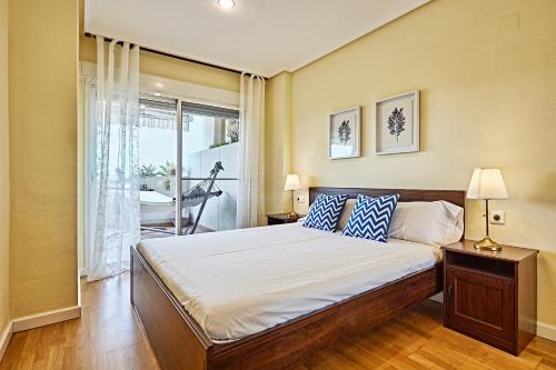 Postel nebo postele na pokoji v ubytování Beferent Riviera Blanca Golf - Playa