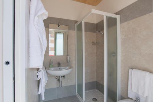 Koupelna v ubytování Hotel Atene