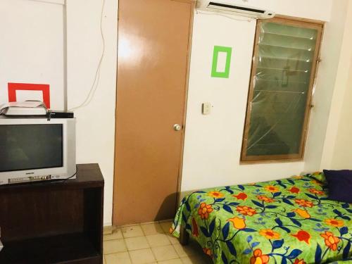 Katil atau katil-katil dalam bilik di Hotel El Kiosco
