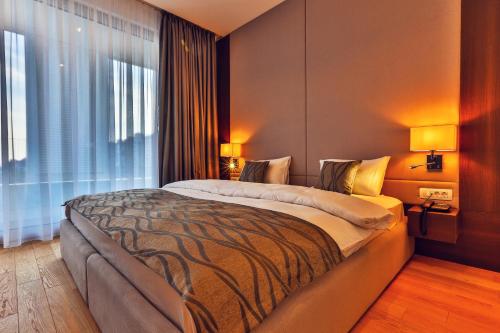 Postel nebo postele na pokoji v ubytování Hotel WOW