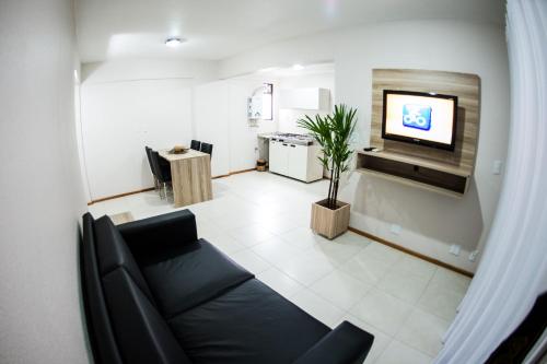 Μια τηλεόραση ή/και κέντρο ψυχαγωγίας στο Aquarius Hotel Flat Residence