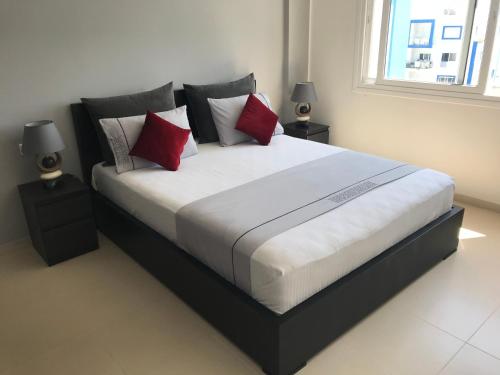 Postel nebo postele na pokoji v ubytování Residence cabo negro