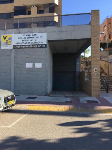 a parking garage with a car parked next to it at Tudela balcón de Bardenas in Tudela