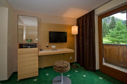 TV a/nebo společenská místnost v ubytování Hotel Sonnblick
