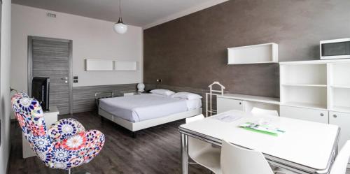 Postel nebo postele na pokoji v ubytování Residence Hotel Torino Uno