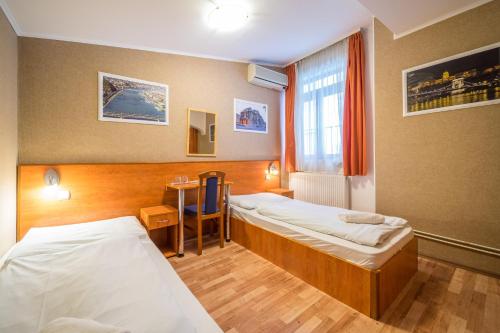 Postel nebo postele na pokoji v ubytování Easy Star Hotel