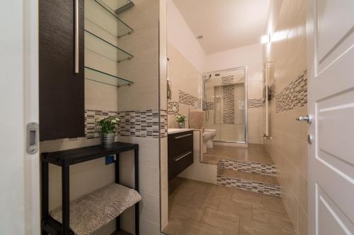 a bathroom with a sink and a toilet and a mirror at duallook in Florence