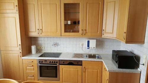 Η κουζίνα ή μικρή κουζίνα στο Monteur Apartment Scarlett