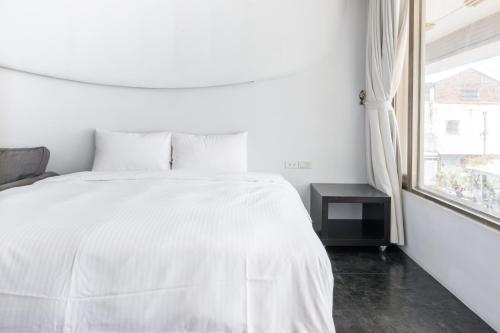 Ein Bett oder Betten in einem Zimmer der Unterkunft Modena B&B