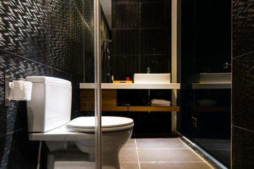 Ein Badezimmer in der Unterkunft Modena B&B