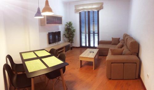 Posedenie v ubytovaní Apartamento Santa Faz