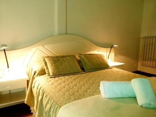 Postel nebo postele na pokoji v ubytování Hotel Crespo