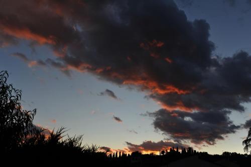 a sunset with clouds in the sky at Villa Le Facezie B&B in Terranuova Bracciolini