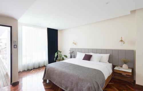 Postel nebo postele na pokoji v ubytování La Inmaculada Hotel