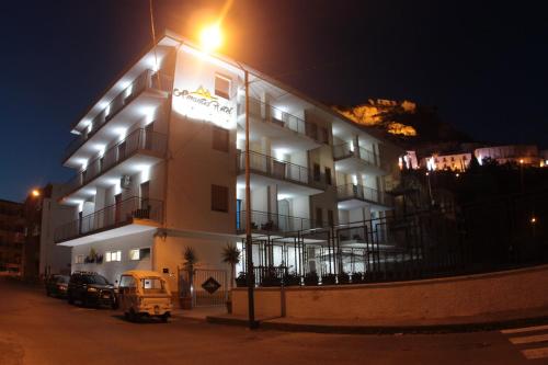 a building with a street light in front of it at A'MANTIA HOTEL in Amantea