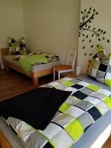Postel nebo postele na pokoji v ubytování Ferienwohnung"Zur Birke"