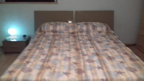 Posteľ alebo postele v izbe v ubytovaní Lume Blu