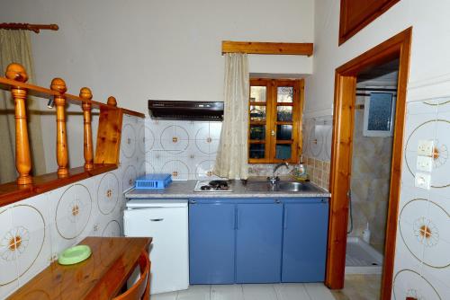 Кухня или кухненски бокс в Bikakis Family Apartments
