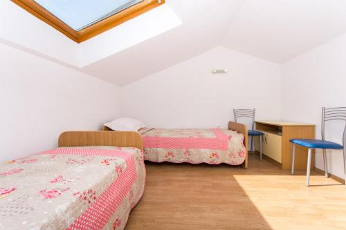 Katil atau katil-katil dalam bilik di Apartments Tomislav