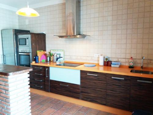 Kuchyň nebo kuchyňský kout v ubytování Chalet Duna