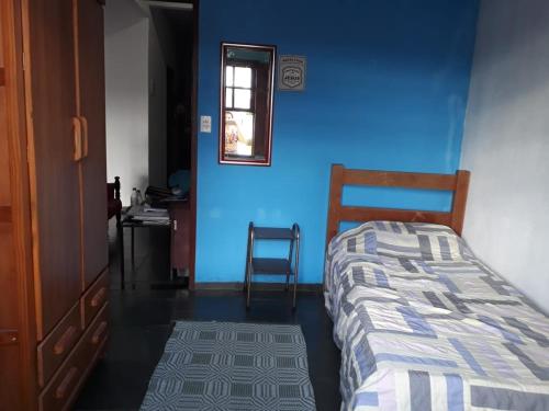 Ένα ή περισσότερα κρεβάτια σε δωμάτιο στο Casa da Lapa