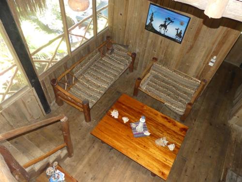 Μια τηλεόραση ή/και κέντρο ψυχαγωγίας στο Hotel Kangaroo y Restaurante