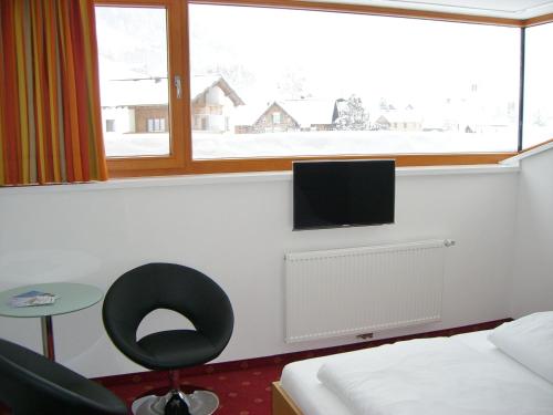 TV a/nebo společenská místnost v ubytování Haus Helga