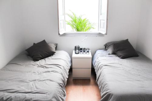 Een bed of bedden in een kamer bij Atelier 3