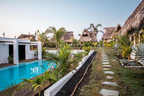 a view of a resort with a swimming pool at Swell in El Paredón Buena Vista
