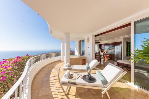 a villa with a view of the ocean at Grand Miramar All Luxury Suites & Residences in Puerto Vallarta