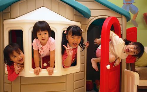 three little girls playing in a toy house at Caesar Park Hotel Kenting in Kenting