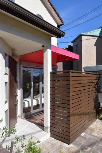 a wooden fence in front of a house at Kyoto - house / Vacation STAY 1099 in Kyoto