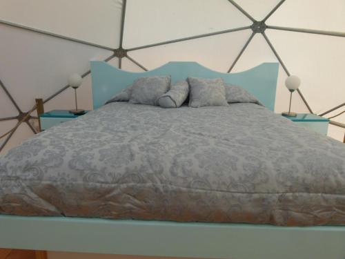 Postel nebo postele na pokoji v ubytování Punta de domos