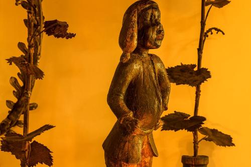a statue of a woman standing next to flowers at Albergo Al Moretto in Castelfranco Veneto