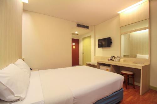 Katil atau katil-katil dalam bilik di Ten Stars Hotel
