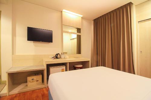 Televisyen dan/atau pusat hiburan di Ten Stars Hotel