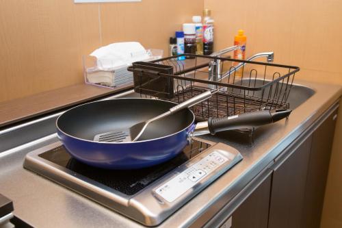 Una cocina o cocineta en Ryokan Hostel Gion