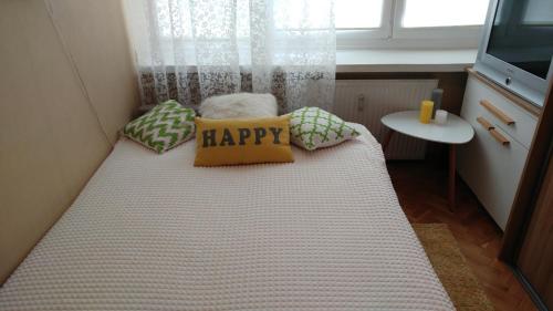 Katil atau katil-katil dalam bilik di Apartament Centrum