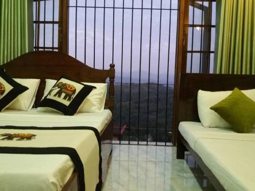 Postel nebo postele na pokoji v ubytování Serenity Hill Oasis