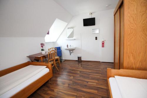 Ένα ή περισσότερα κρεβάτια σε δωμάτιο στο Hotel Olympia