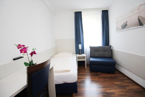 Χώρος καθιστικού στο Hotel Olympia