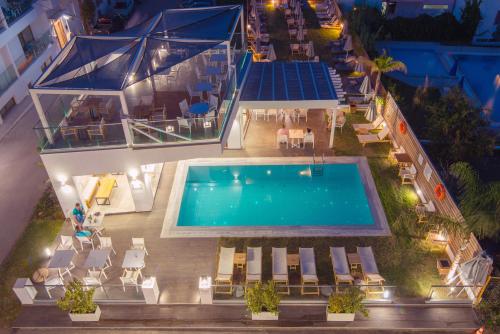 an overhead view of a swimming pool at night at Harma Boutique Hotel in Hersonissos