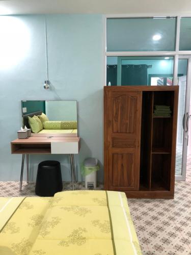 เตียงในห้องที่ At Sichon Home By At Sichon Resort