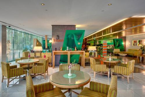 
A restaurant or other place to eat at Al Khoory Executive Hotel, Al Wasl
