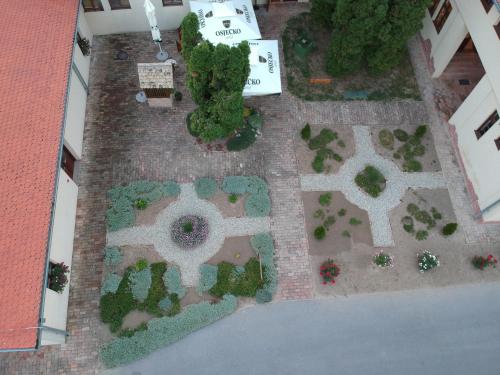 an overhead view of a garden in a building at Hotel Lug in Osijek