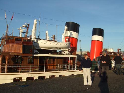 a group of people standing on top of a boat at Burnside Guest House in Ayr