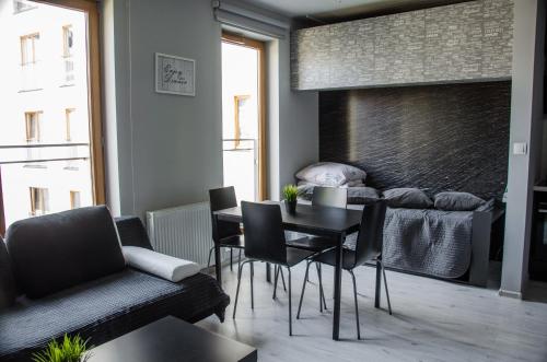 Posedenie v ubytovaní Apartament Expo Brylowska