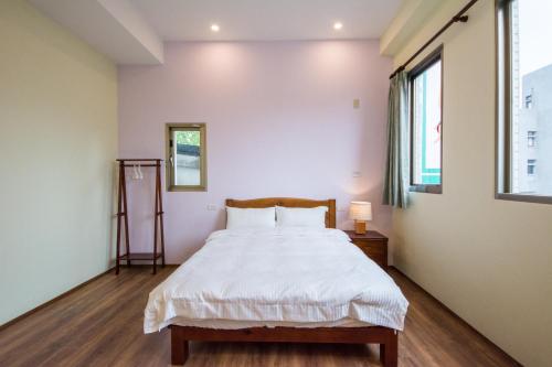 Una cama o camas en una habitación de 7-113 hotel